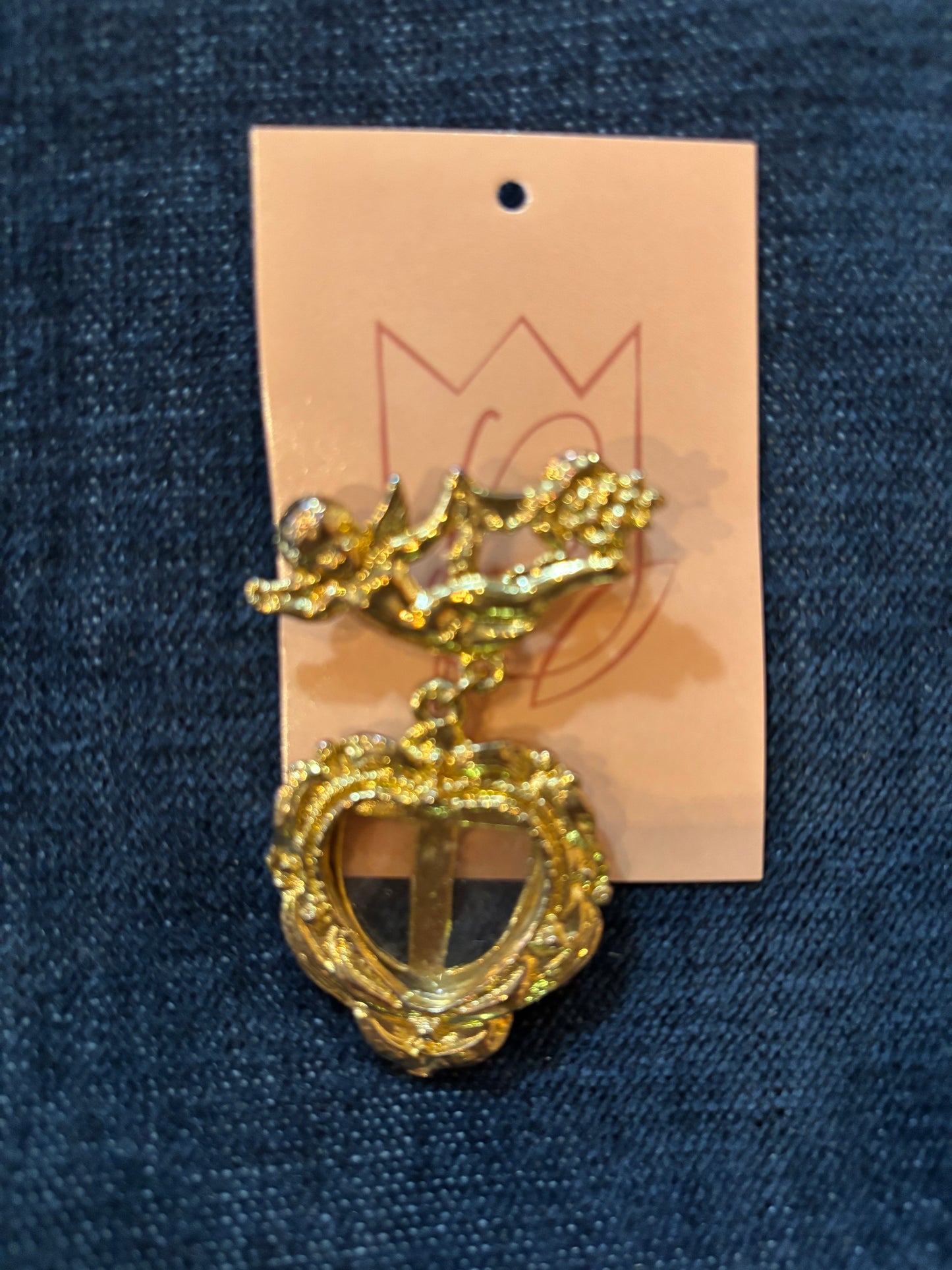 Folly Floral Cherub Brooch 1970
